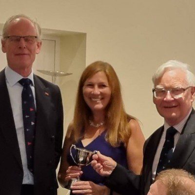 Chris Preston presents the Craig Cup to Actuaries Master, Julie Griffiths and Richard Hawkes.
